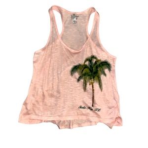 EUC peach colored women’s racerback tank top. Size: XL.
